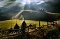 Mountain landscape with autumn morning fog at sunrise - Romania Royalty Free Stock Photo