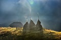 Mountain landscape with autumn morning fog at sunrise - Romania Royalty Free Stock Photo