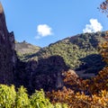 Mountain landscape background with peruvian Andes mountains in the clouds