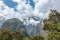 Mountain landscape background with peruvian Andes mountains in the clouds