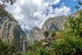 Mountain landscape background with peruvian Andes mountains in the clouds