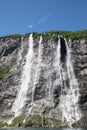 Mountain landscape with blue sky. Beautiful nature Norway. Geiranger fjord. Seven Sisters Waterfall Royalty Free Stock Photo