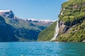 Mountain landscape with blue sky. Beautiful nature Norway. Geiranger fjord. Seven Sisters Waterfall Royalty Free Stock Photo