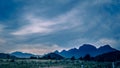 Mountain landscape with a dawn,Cute rural landscape tree, field, mountains . landscape of mountains and meadow .Prachubkeereekhan