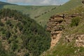 Mountain landscape with deep gorge. mountains, green pass. Picturesque scenery with beautiful hills and rocks. Colorful view to