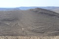 Mountain landscape, desert. Makhtesh Ramon Crater in Negev desert, Israel. Stony desert panoramic view. Unique relief Royalty Free Stock Photo