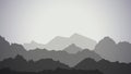 Mountain landscape at dusk. Rocky outlines.