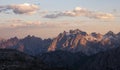 Mountain landscape in the European Dolomite Alps at the Three Peaks with alpenglow during sunset, South Tyrol Italy Royalty Free Stock Photo