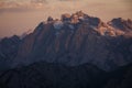 Mountain landscape in the European Dolomite Alps at the Three Peaks with alpenglow during sunset, South Tyrol Italy Royalty Free Stock Photo