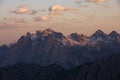 Mountain landscape in the European Dolomite Alps at the Three Peaks with alpenglow during sunset, South Tyrol Italy Royalty Free Stock Photo