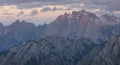 Mountain landscape in the European Dolomite Alps underneath the Three Peaks with alpenglow during sunset, South Tyrol Italy Royalty Free Stock Photo