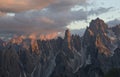 Mountain landscape in the European Dolomite Alps underneath the Three Peaks with alpenglow during sunset, South Tyrol Italy Royalty Free Stock Photo