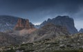 Mountain landscape in the European Dolomite Alps underneath the Three Peaks with alpenglow during sunset, South Tyrol Italy Royalty Free Stock Photo