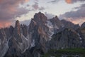 Mountain landscape in the European Dolomite Alps underneath the Three Peaks with alpenglow during sunset, South Tyrol Italy Royalty Free Stock Photo