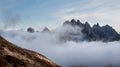 Mountain landscape with fog in autumn. Tre Cime dolomiti Italy