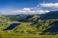 Mountain landscape and glacial Bucura lake in Retezat National Park, Carpathian Mountains, Romania Royalty Free Stock Photo