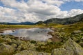 Mountain landscape and glacial lake in Retezat National Park, Carpathian Mountains, Romania Royalty Free Stock Photo