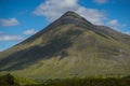 Mountain landscape in the Glencoe area in Scotland, Springtime view mountains with grassland and countryside road in the valley of Royalty Free Stock Photo