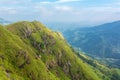 Mountain landscape, green slopes. Beauty of mountains. Little Adam peak, mountain in the fog view from the jungle Royalty Free Stock Photo