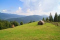 Mountain landscape with haystacks. Royalty Free Stock Photo