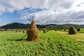 Mountain landscape with haystacks Royalty Free Stock Photo