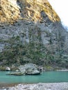 Mountain with the Khosta River in the foreground. Yew-boxwood grove, Sochi