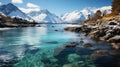 Mountain landscape, lake and mountain panorama. Alpine lake with crystal clear blue water and perfect blue sky Royalty Free Stock Photo