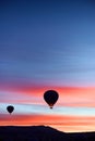 Mountain landscape with large balloons in a short summer season at dawn