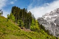 Mountain landscape with majestic peaks, lush greenery. Nature photography. Scenic, outdoors, adventure, travel, hiking, wilderness