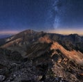 Mountain landscape with night sky and Mliky way, Slovakia Tatras from peak Slavkovsky stit