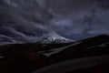 Mountain landscape: night view on active Koryaksky Volcano on a sunny day. Koryaksky-Avachinsky Group of Volcanoes, Kamchatka Peni