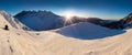 Mountain landscape panoramic view with blue sky Gorgeous winter sunset in mountains, Alps. Colorful outdoor scene, Christmas. Royalty Free Stock Photo