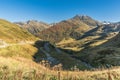 Mountain landscape with pass road at Oberalp Pass, Canton of Graubuenden, Switzerland Royalty Free Stock Photo