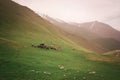 Mountain landscape with people and horses. Royalty Free Stock Photo