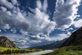Mountain landscape with river and clouds. altai republic