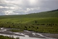 Mountain landscape with river and clouds in Denali National Park and Preserve Alaska Royalty Free Stock Photo