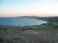 View from a great height of the bay during calm in the evening at sunset