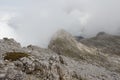 Mountain landscape seeing through dense fog, Dolomites, Italian Alps Royalty Free Stock Photo