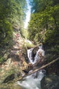 Mountain landscape in Slovakia. Magical forest in natural park .People climbing on steep rock on via ferrata martinske hole