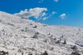 Mountain landscape with snow a sunny day and blue sky. winter photo. Royalty Free Stock Photo