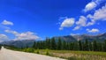 Mountain landscape on a summer day in the mountains gave a clear day away green forest against the blue sky. Royalty Free Stock Photo