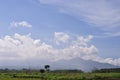 Mountain landscape and sunny clouds Royalty Free Stock Photo