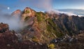 Mountain landscape at sunset in Madeira. Amazing view on colorful clouds and layered mountains Royalty Free Stock Photo