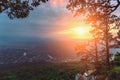 Mountain landscape at sunset in summer time, beautiful view from top of rock to valley between mountains Royalty Free Stock Photo