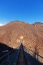 Mountain landscape with suspension bridge Royalty Free Stock Photo