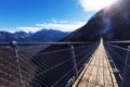 Mountain landscape with suspension bridge Royalty Free Stock Photo