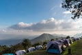 Mountain landscape and tent dramatic evening sky