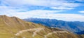 Mountain landscape with white sutra streamer scattered on the gr