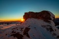 Mountain landscape with winter fog at sunse of Ceahlau, Romaniat Royalty Free Stock Photo