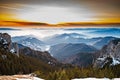 Mountain landscape with winter fog at sunse of Ceahlau, Romaniat Royalty Free Stock Photo